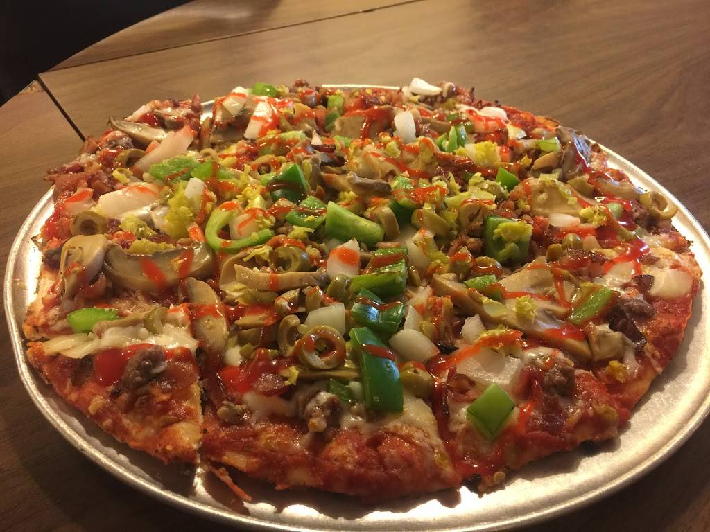 Pizza Man of Salem | restaurant | 1413 W Main St, Salem, IL 62881, USA | 6185485331 OR +1 618-548-5331
