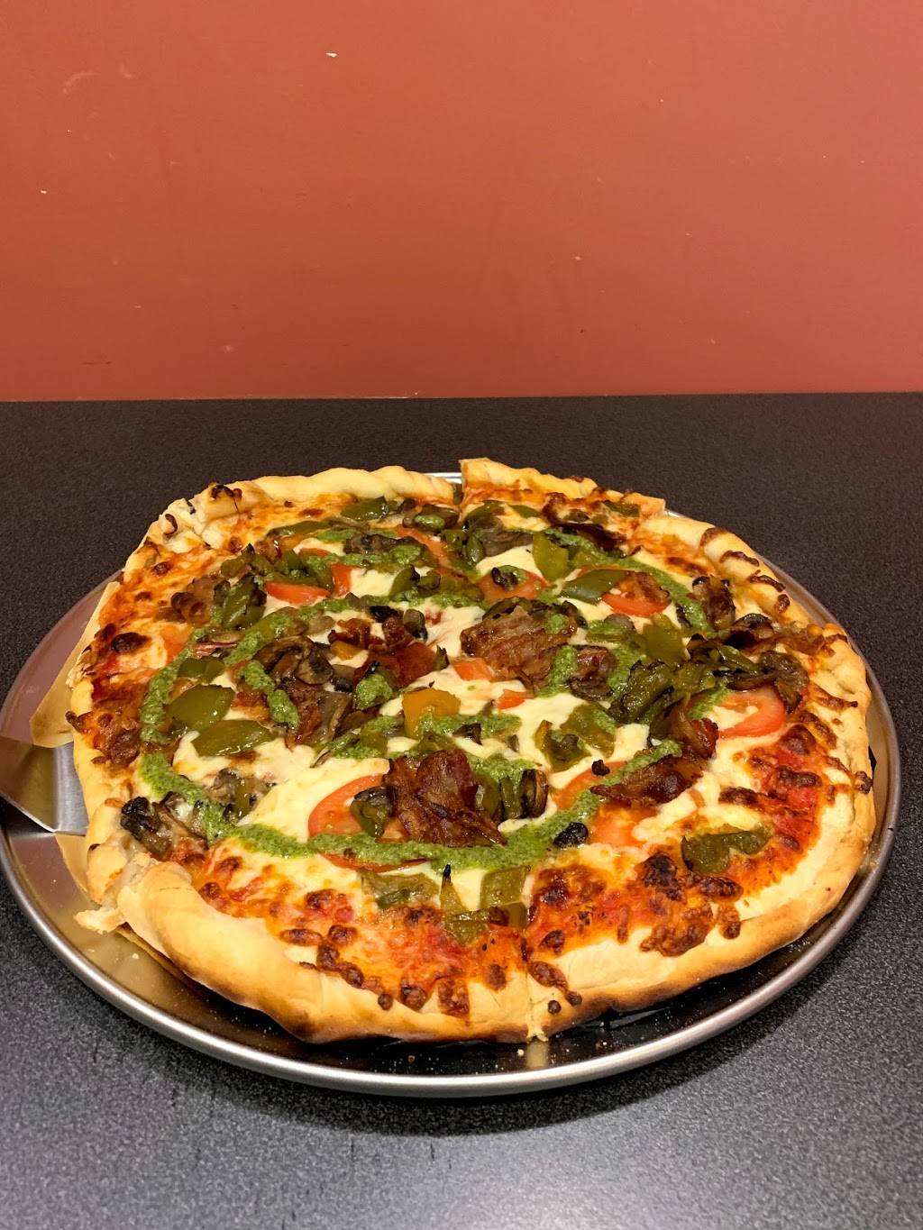 Redemption Pizza | restaurant | 9 N Jefferson St, Farmington, MO 63640, USA | 5737564555 OR +1 573-756-4555